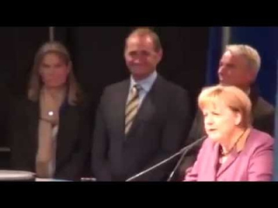 Merkel greeted as a traitor with  massive booing